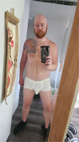 Tighties of white but with a peek-a-boo flap-cover